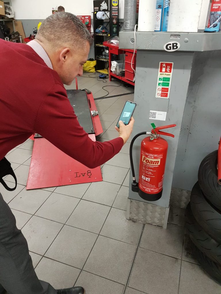 Man checking HiViz Asset label